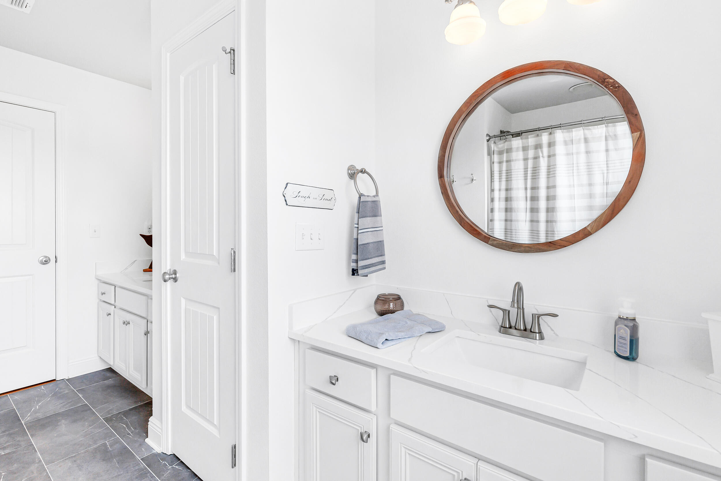 136 Grayling Way Inlet Beach, FL 32461 - Photo 20 of 22 a bathroom with a sink and a mirror