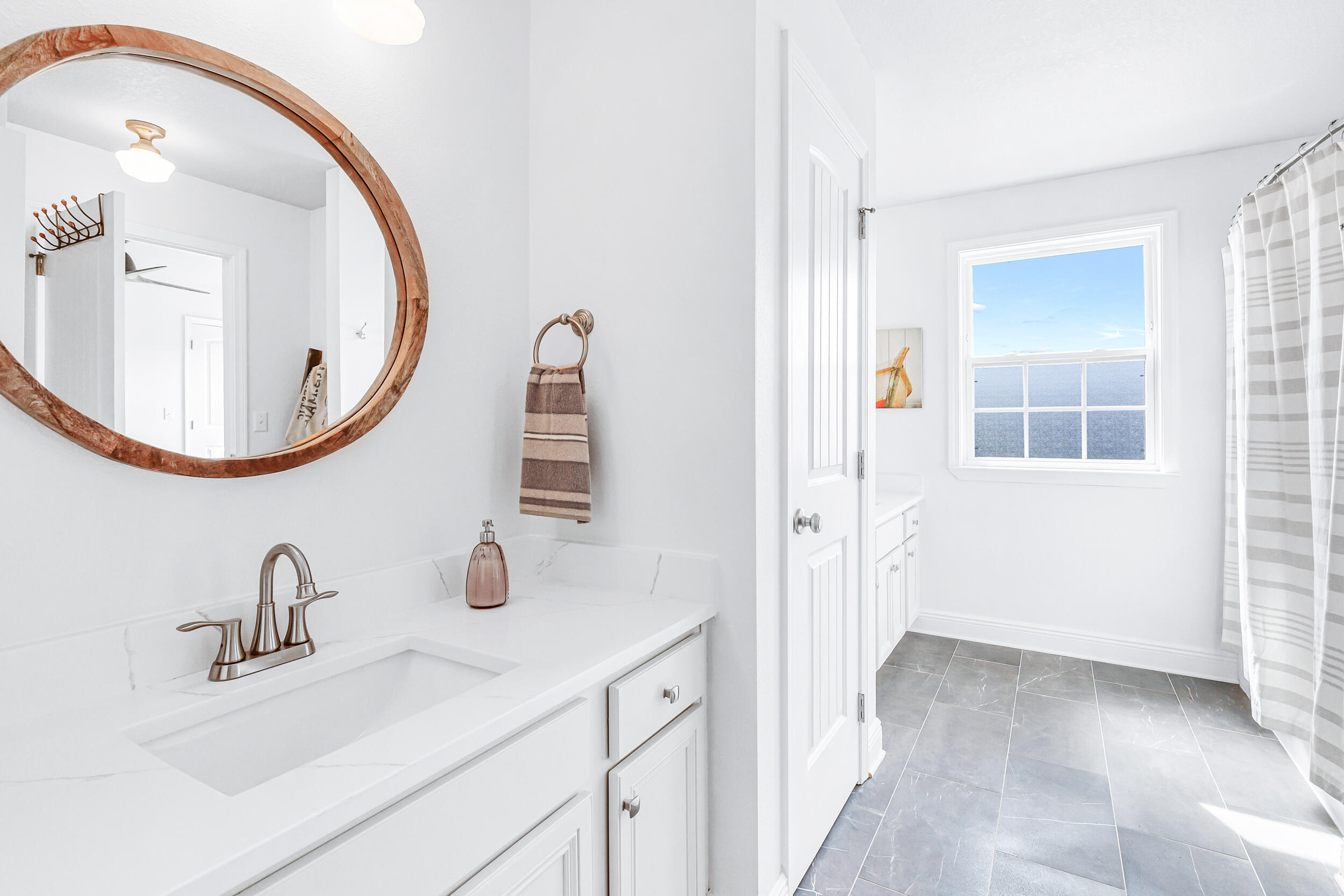 136 Grayling Way Inlet Beach, FL 32461 - Photo 21 of 22 a bathroom with a sink and a mirror