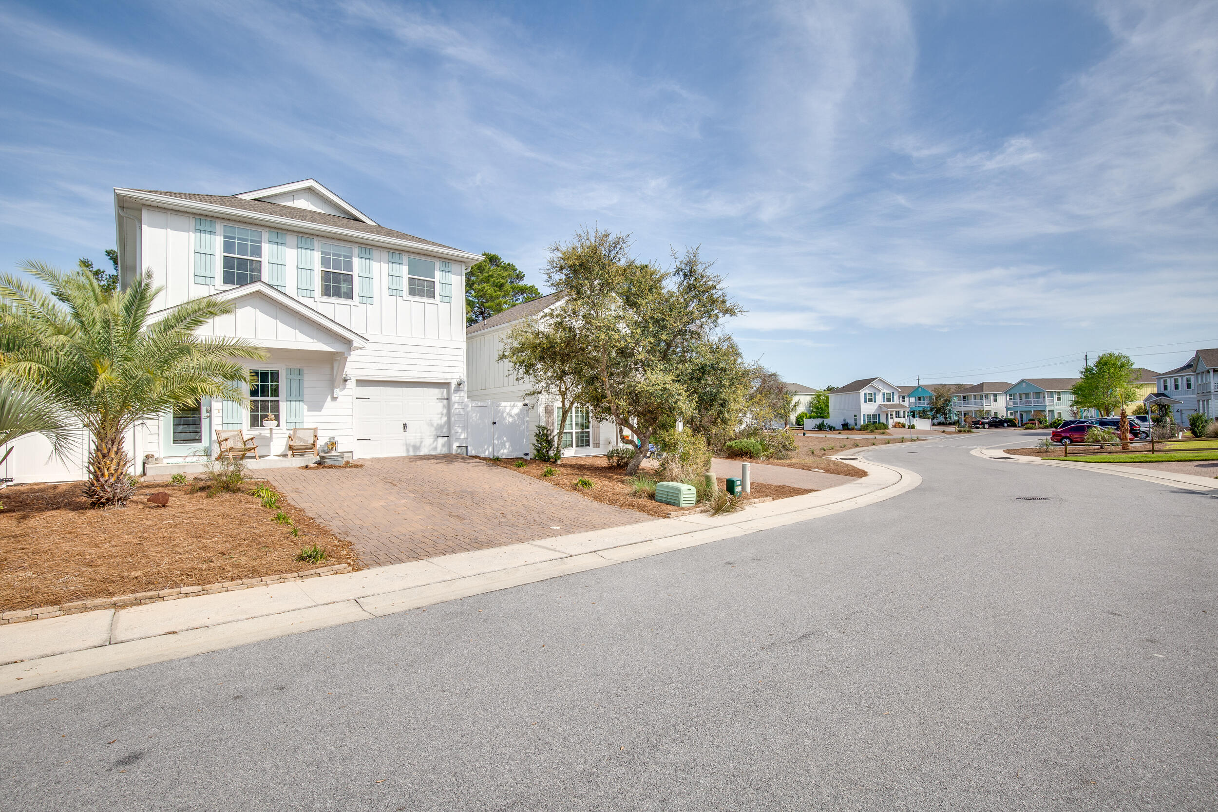 136 Grayling Way Inlet Beach, FL 32461 - Photo 22 of 22 a view of a house with a swimming pool and a chairs and table in the house
