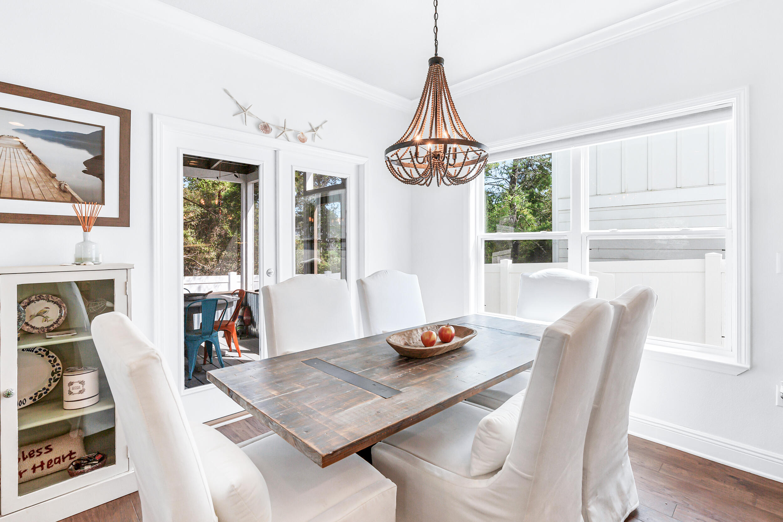 136 Grayling Way Inlet Beach, FL 32461 - Photo 8 of 22 a view of a dining room with furniture window and wooden floor