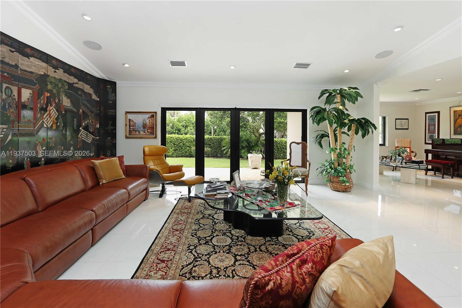 3650 North 36th Avenue, Unit 2 Hollywood, FL 33021 - Photo 13 of 52 a living room with furniture and a large window