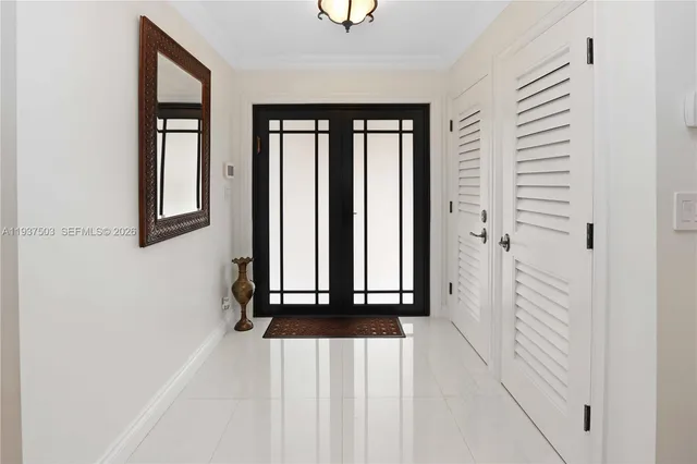 a view of a entryway with wooden floor
