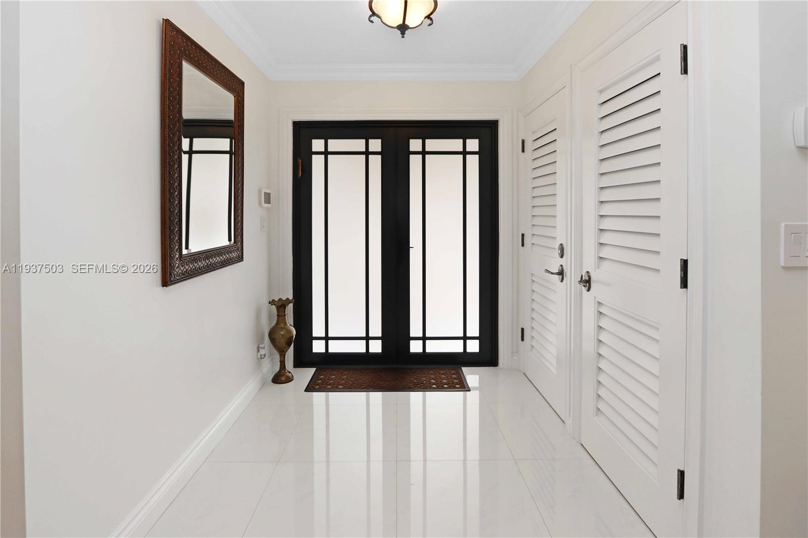 3650 North 36th Avenue, Unit 2 Hollywood, FL 33021 - Photo 17 of 52 a view of a entryway with wooden floor