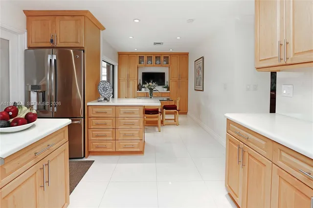 a living room with a flat screen tv and a couch