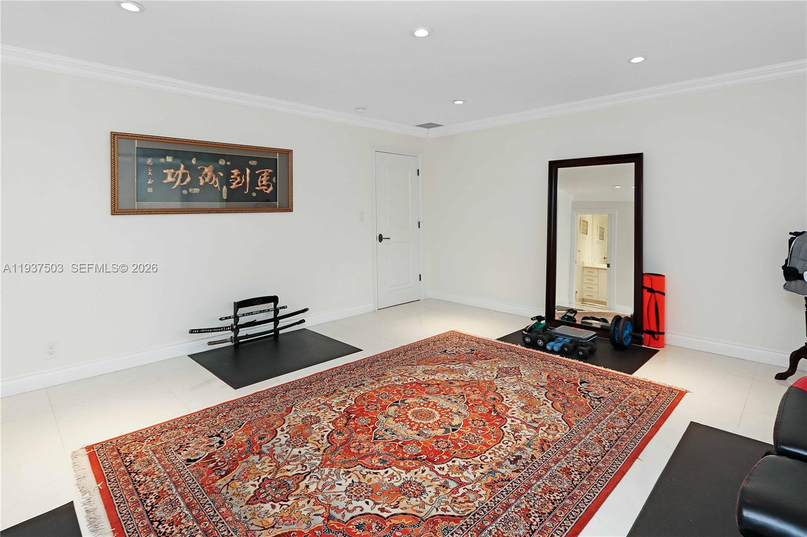 3650 North 36th Avenue, Unit 2 Hollywood, FL 33021 - Photo 32 of 52 a bedroom with a bed and a dresser