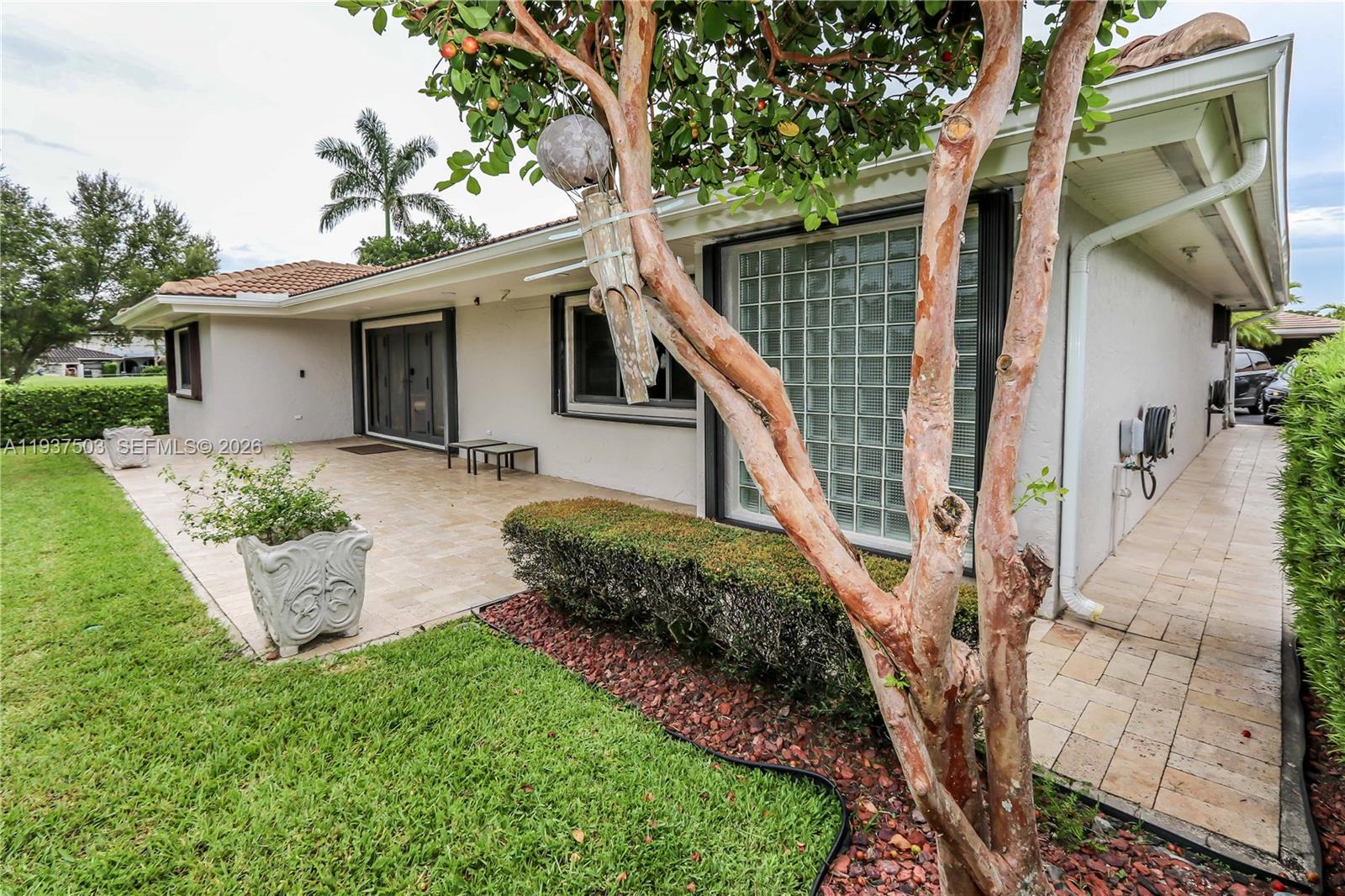 3650 North 36th Avenue, Unit 2 Hollywood, FL 33021 - Photo 39 of 52 a front view of a house with a yard