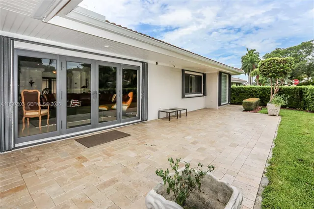 a house view with a backyard space