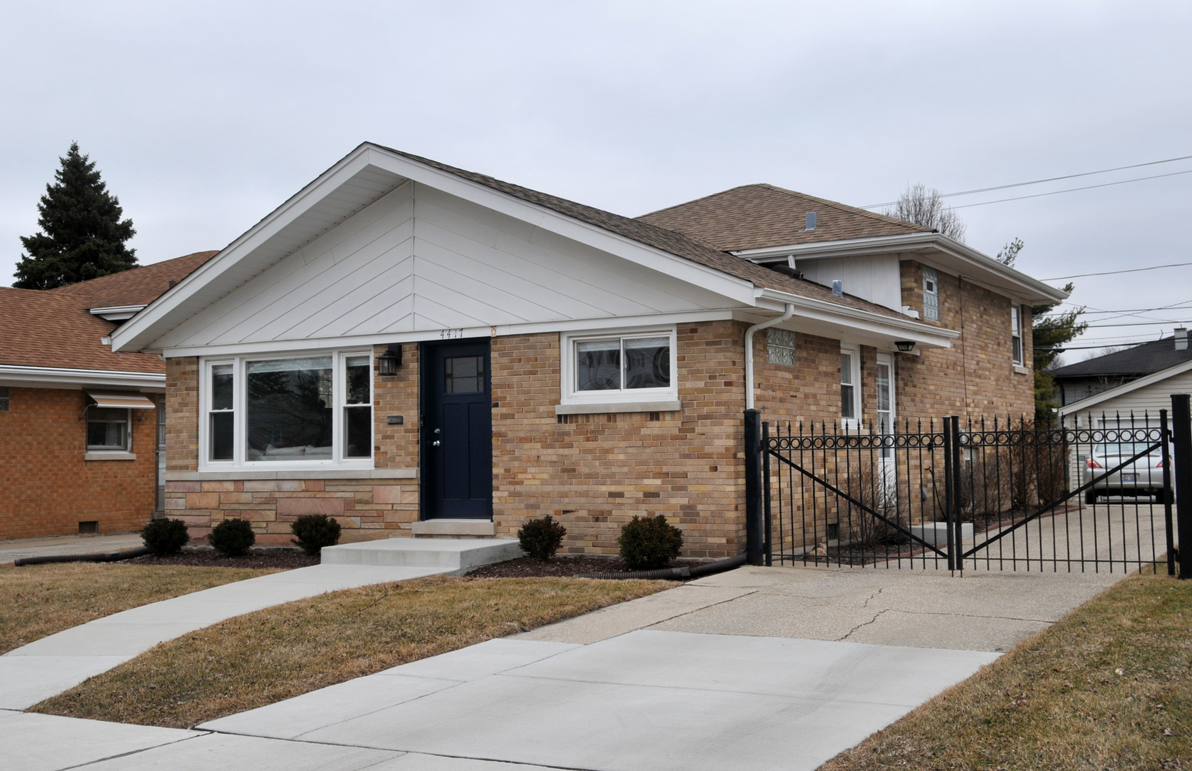 4417 Arthur Avenue Brookfield, IL 60513 - Photo 1 of 19 a front view of a house with garage