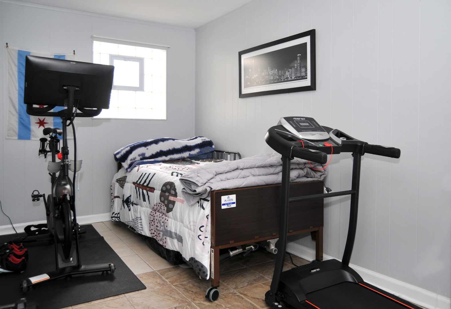 4417 Arthur Avenue Brookfield, IL 60513 - Photo 14 of 19 a bedroom with a bed and a flat screen tv