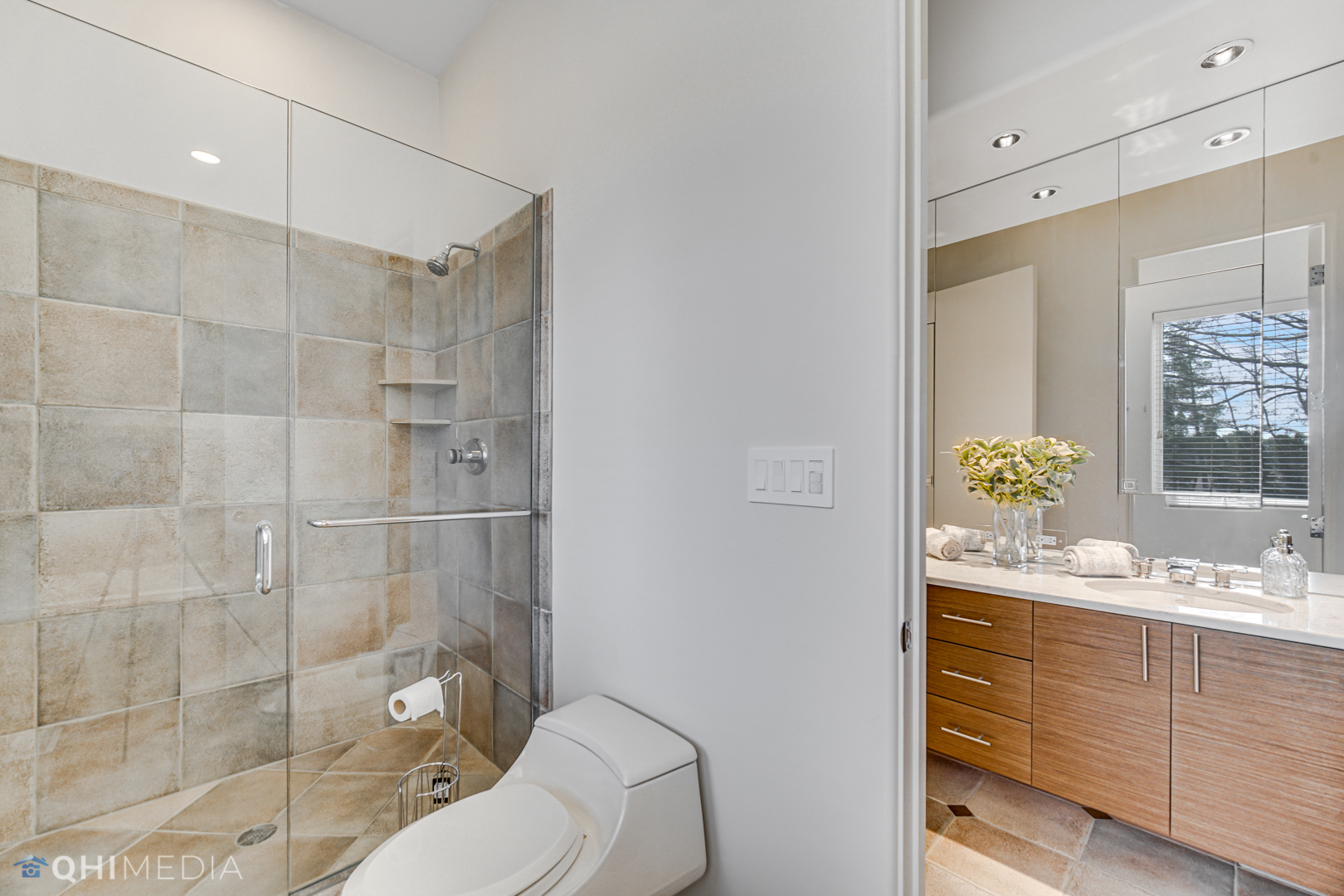 2225 Greenview Road Northbrook, IL 60062 - Photo 17 of 68 a bathroom with a sink shower and a toilet
