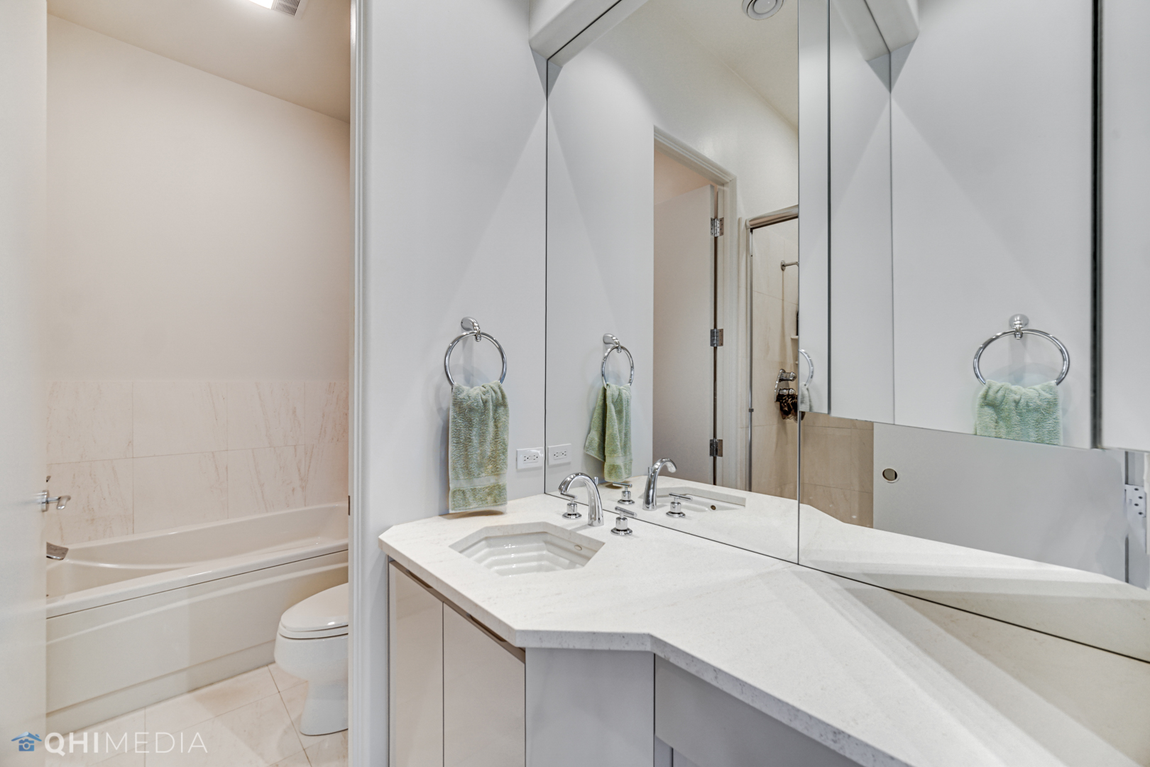 2225 Greenview Road Northbrook, IL 60062 - Photo 23 of 68 a bathroom with a sink and a mirror