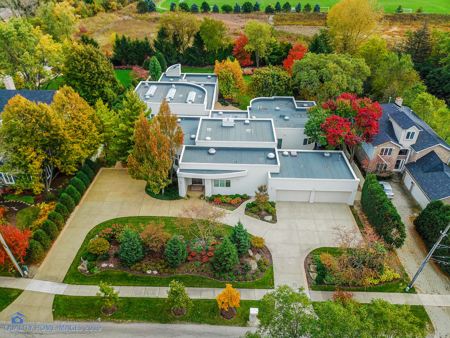 2225 Greenview Road Northbrook, IL 60062 - Photo 50 of 68 an aerial view of a house with a garden and lake view