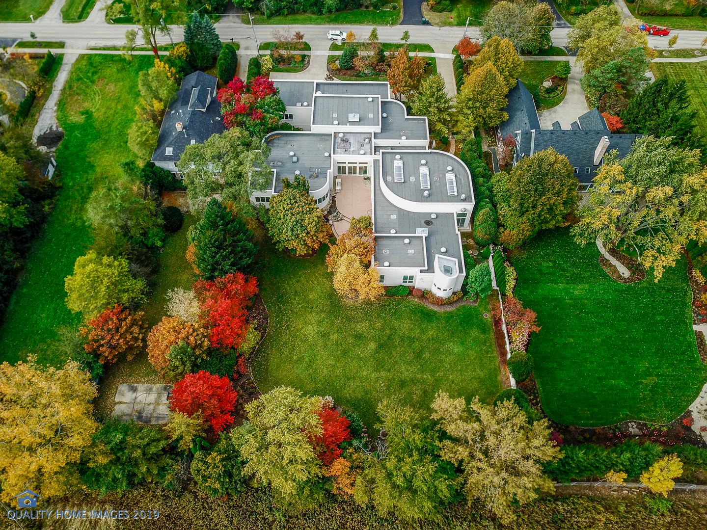 2225 Greenview Road Northbrook, IL 60062 - Photo 52 of 68 a aerial view of a house with a yard and lake view