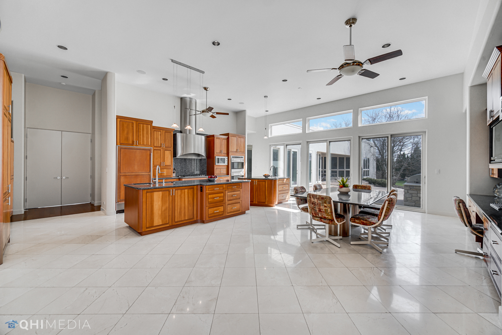 2225 Greenview Road Northbrook, IL 60062 - Photo 10 of 68 a view of kitchen with furniture and chandelier