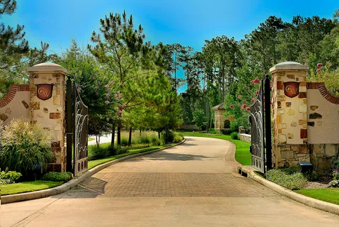 a pathway of a house with a yard