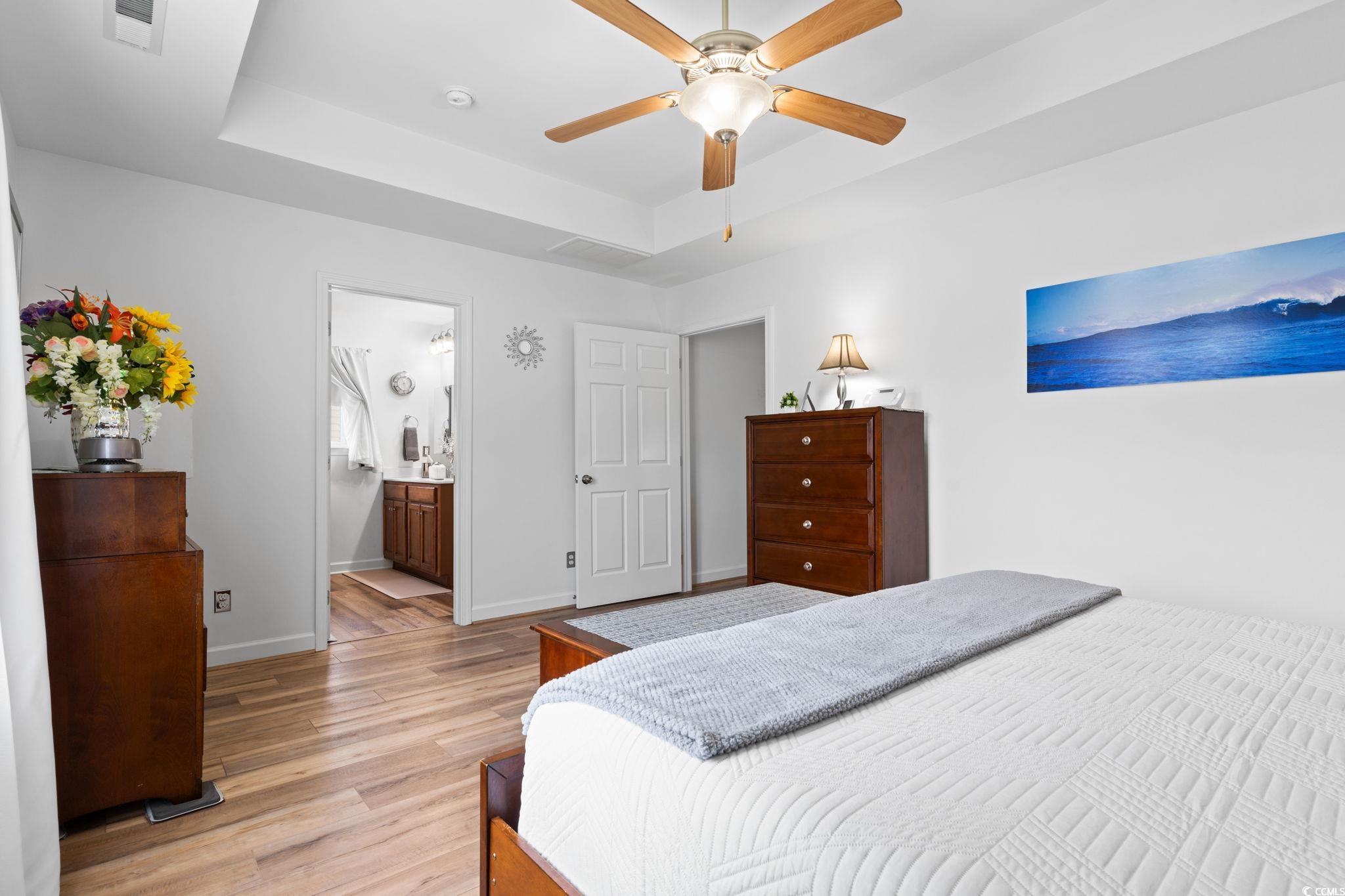 2209 Belladora Road Conway, SC 29527 - Photo 11 of 40 Bedroom featuring light wood-type flooring, a tray