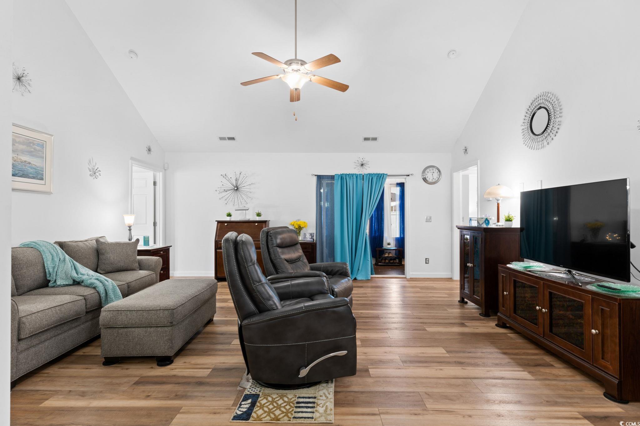 2209 Belladora Road Conway, SC 29527 - Photo 26 of 40 Living room with high vaulted ceiling, a ceiling f