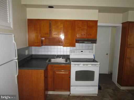 111 Ryers Avenue Cheltenham, PA 19012 - Photo 8 of 12 1ST FLOOR KITCHEN