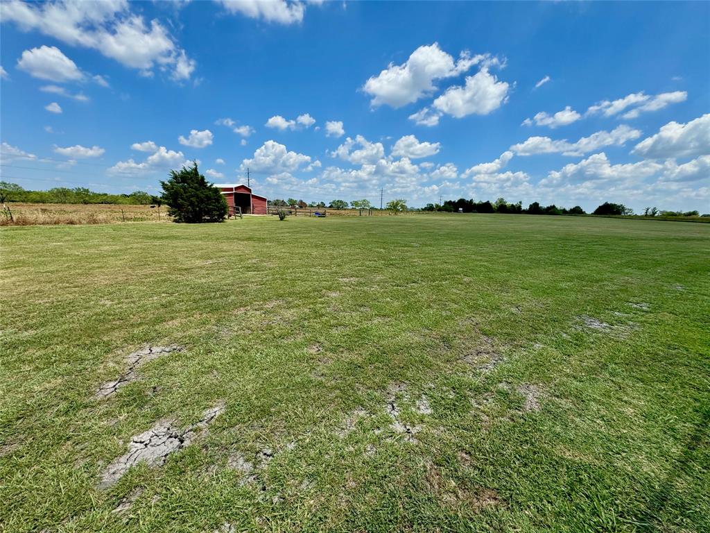 469 Streetman Road Royse City, TX 75189 - Photo 31 of 36 View of yard with an outbuilding and a rural view