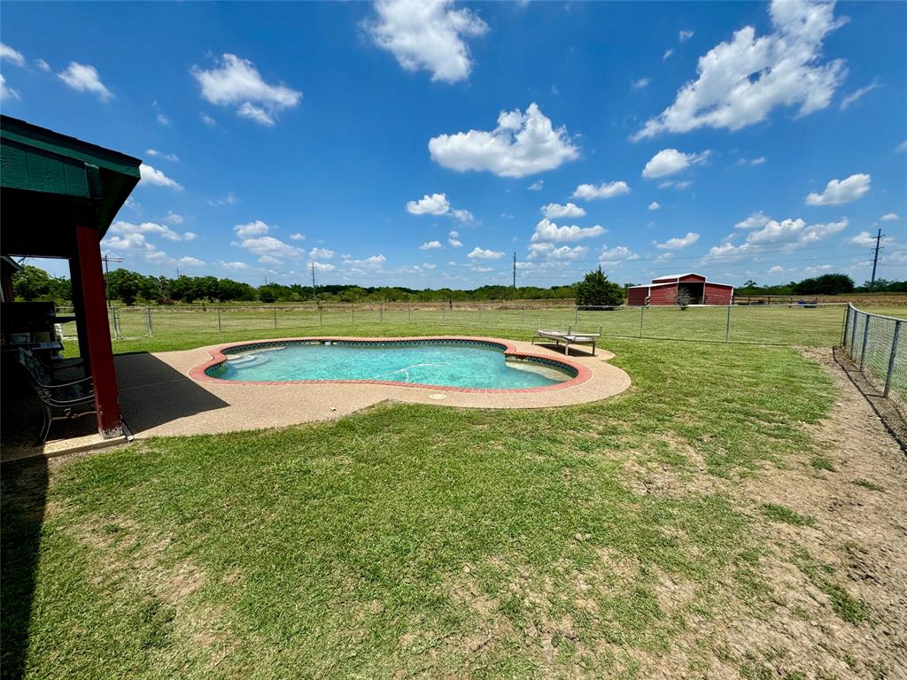 469 Streetman Road Royse City, TX 75189 - Photo 33 of 36 View of swimming pool with a lawn, a patio, a fenced in pool, and fence