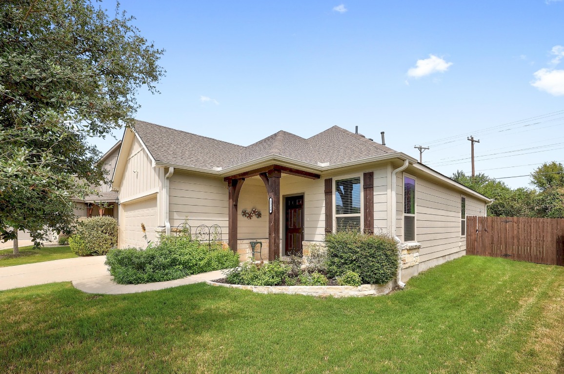 1924 Cliffbrake Way Georgetown, TX 78626 - Photo 1 of 27 a front view of house with yard and green space