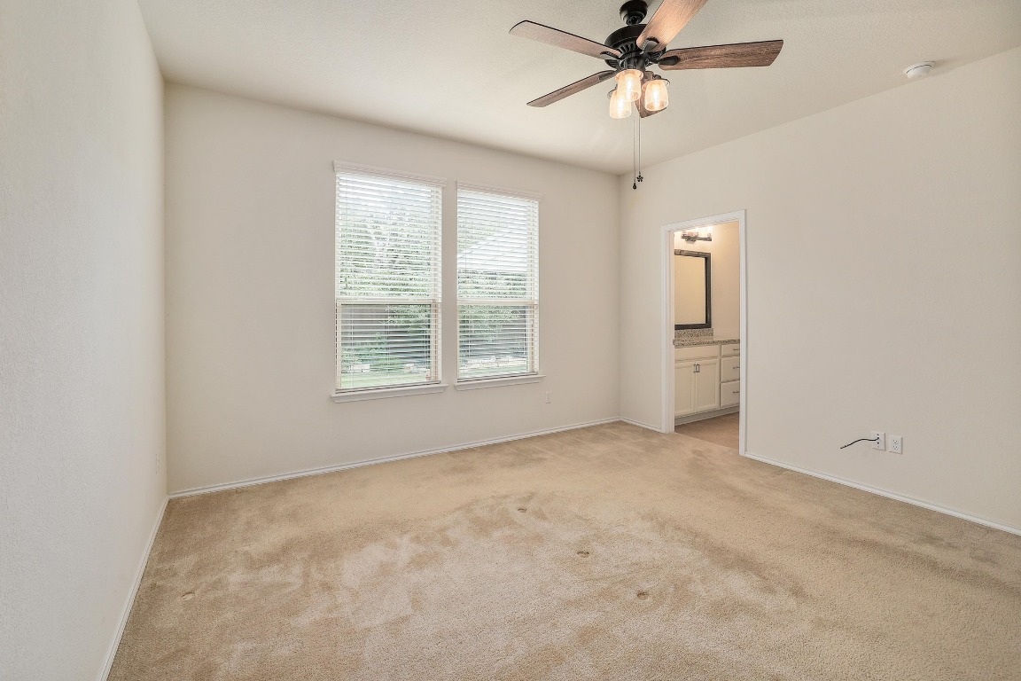 1924 Cliffbrake Way Georgetown, TX 78626 - Photo 15 of 27 an empty room with windows and fan