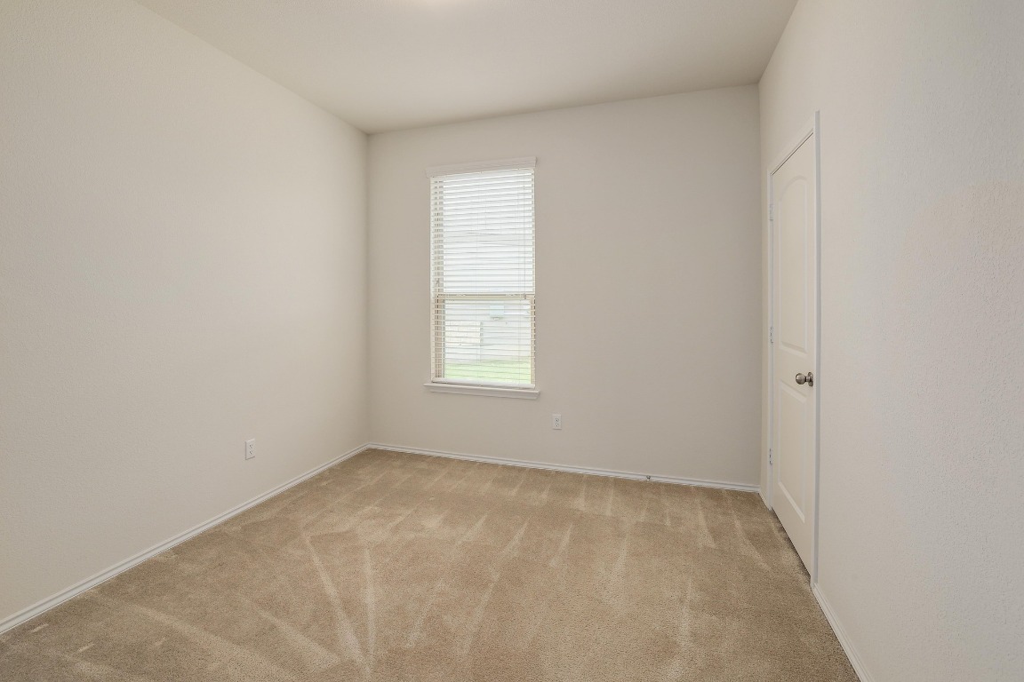 1924 Cliffbrake Way Georgetown, TX 78626 - Photo 21 of 27 an empty room with a window