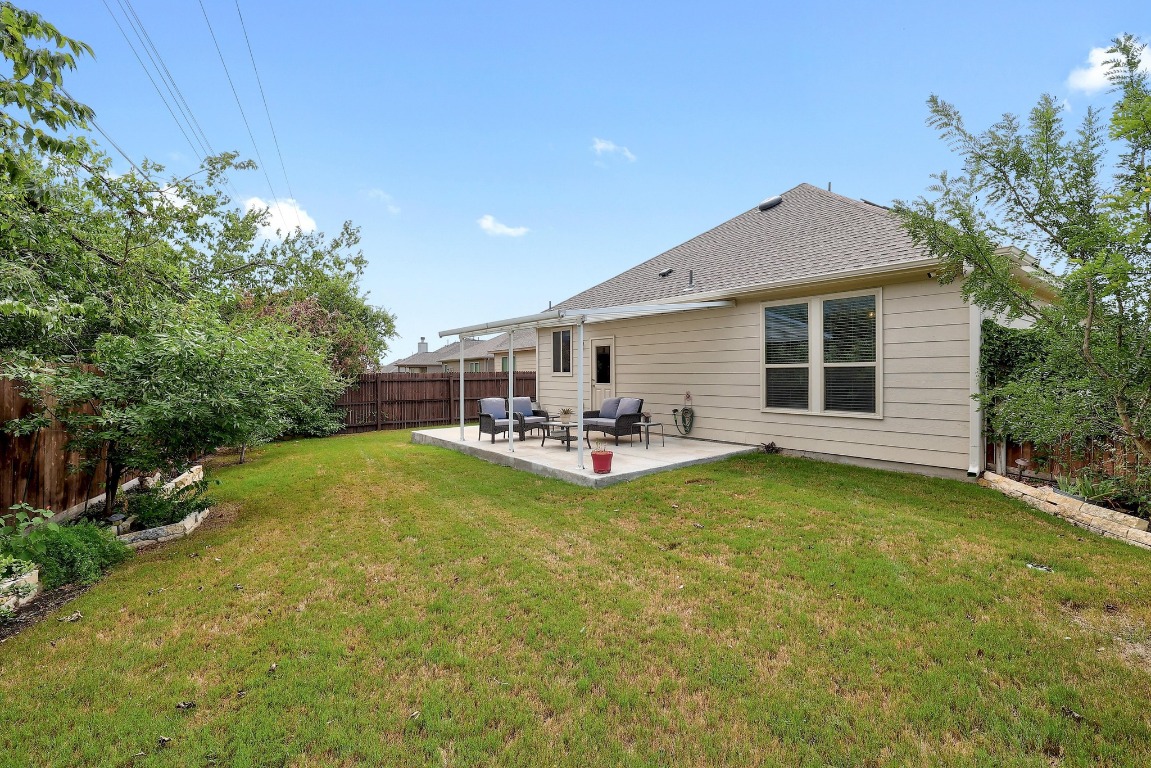 1924 Cliffbrake Way Georgetown, TX 78626 - Photo 26 of 27 a view of a house with pool and chairs