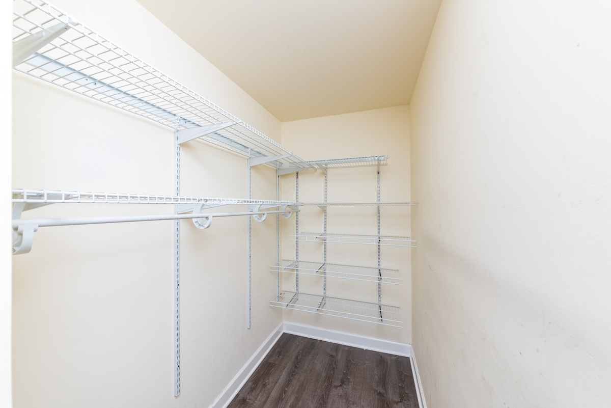 2415 West 24th Street, Unit 6 Chicago, IL 60608 - Photo 9 of 12 a view of a room with racks on the wall