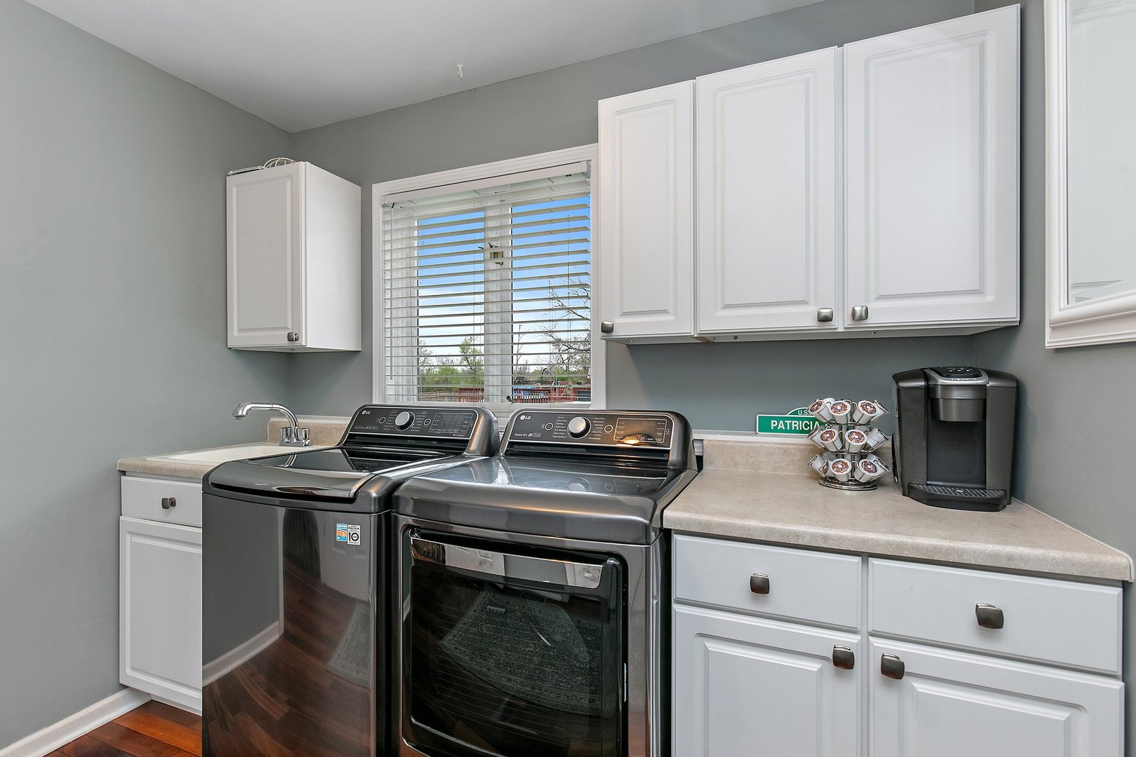 39W343 Hogan Hill Elgin, IL 60124 - Photo 30 of 48 a kitchen with stainless steel appliances granite countertop a sink a stove and a microwave