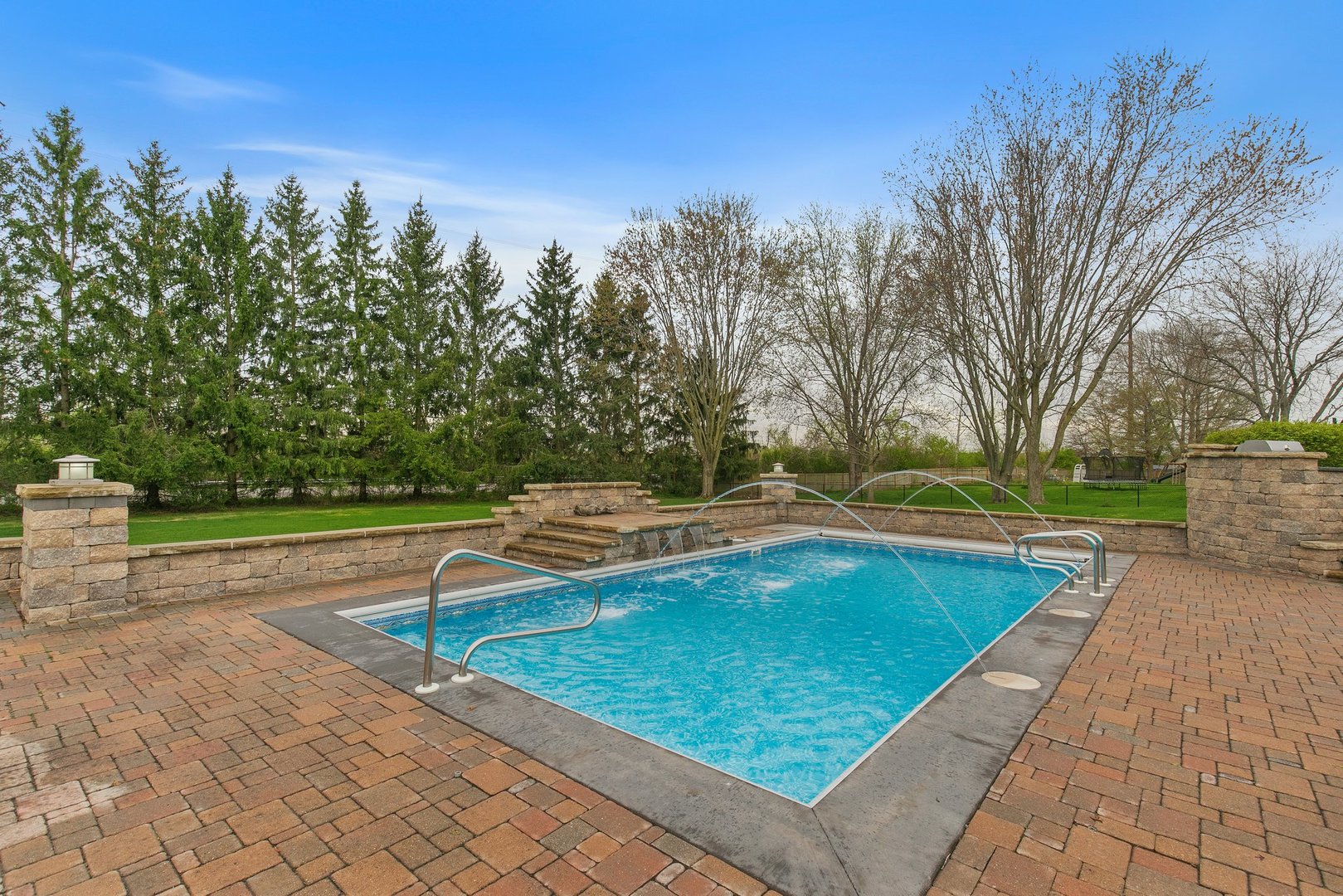 39W343 Hogan Hill Elgin, IL 60124 - Photo 39 of 48 a view of a swimming pool with a yard
