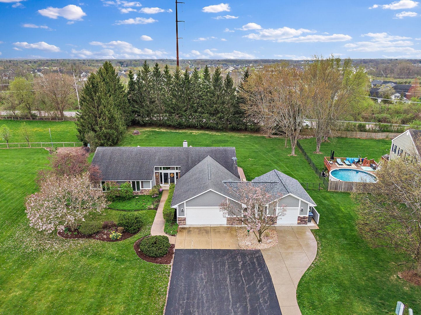 39W343 Hogan Hill Elgin, IL 60124 - Photo 41 of 48 a aerial view of a house with garden space and street view