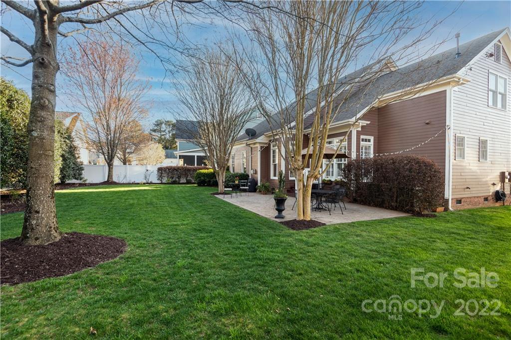 908 Gardenia Street Fort Mill, SC 29708 - Photo 27 of 39 a view of a house with a back yard