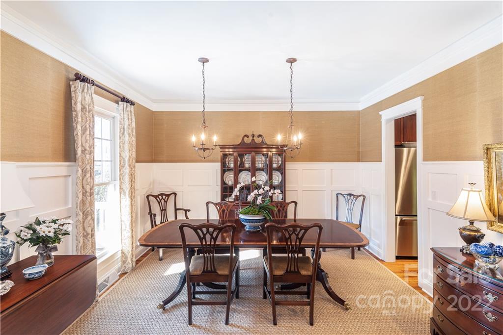 908 Gardenia Street Fort Mill, SC 29708 - Photo 5 of 39 a view of a dining room with furniture and chandelier