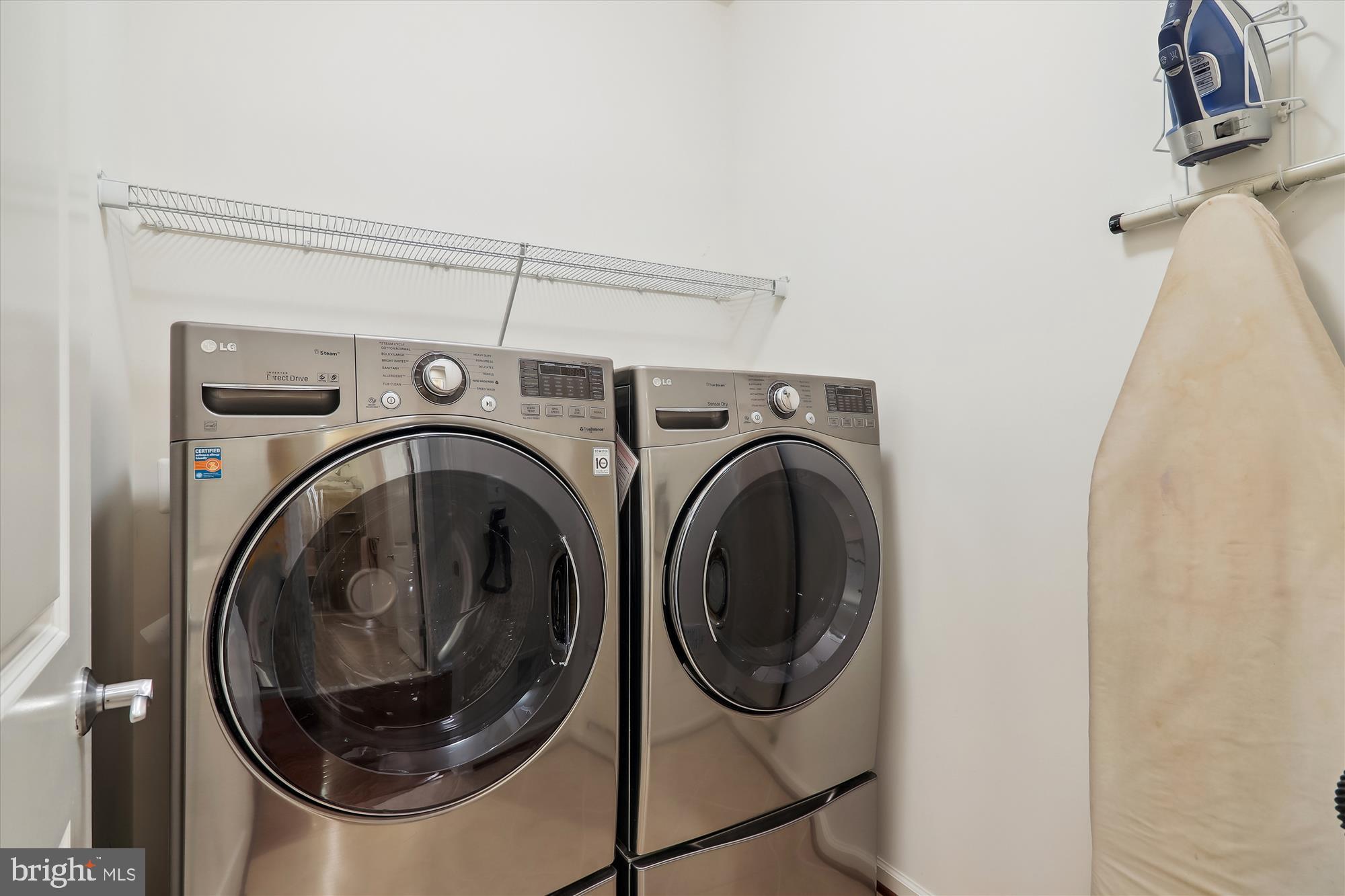 13327 Redspire Drive Silver Spring, MD 20906 - Photo 48 of 90 Laundry room with front loading washer/dryer