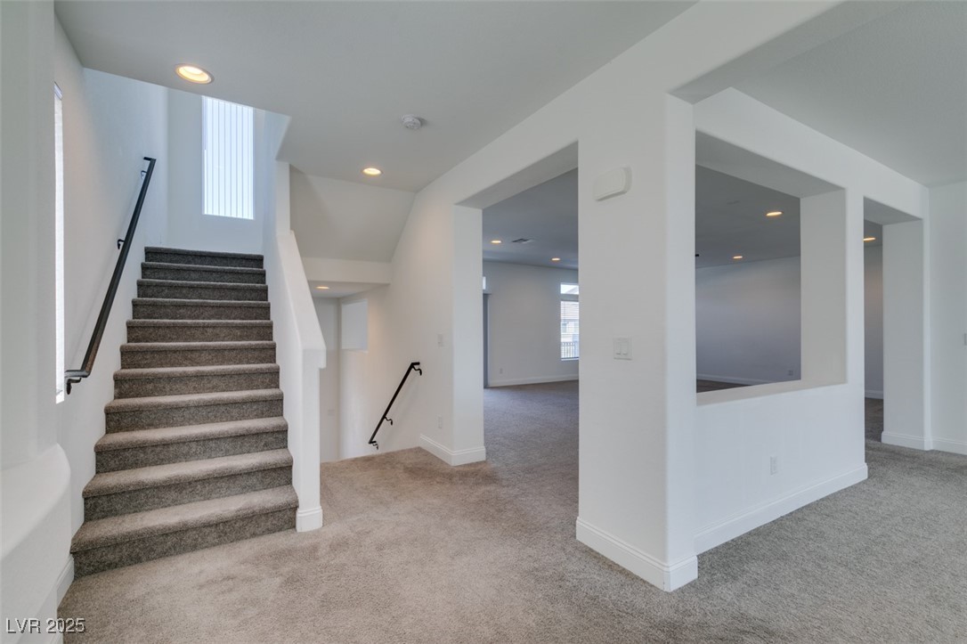 6335 Rock Strm Lane Las Vegas, NV 89141 - Photo 16 of 61 Stairway featuring carpet flooring and recessed lighting