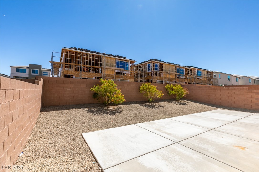 6335 Rock Strm Lane Las Vegas, NV 89141 - Photo 56 of 61 Fenced backyard with a patio area