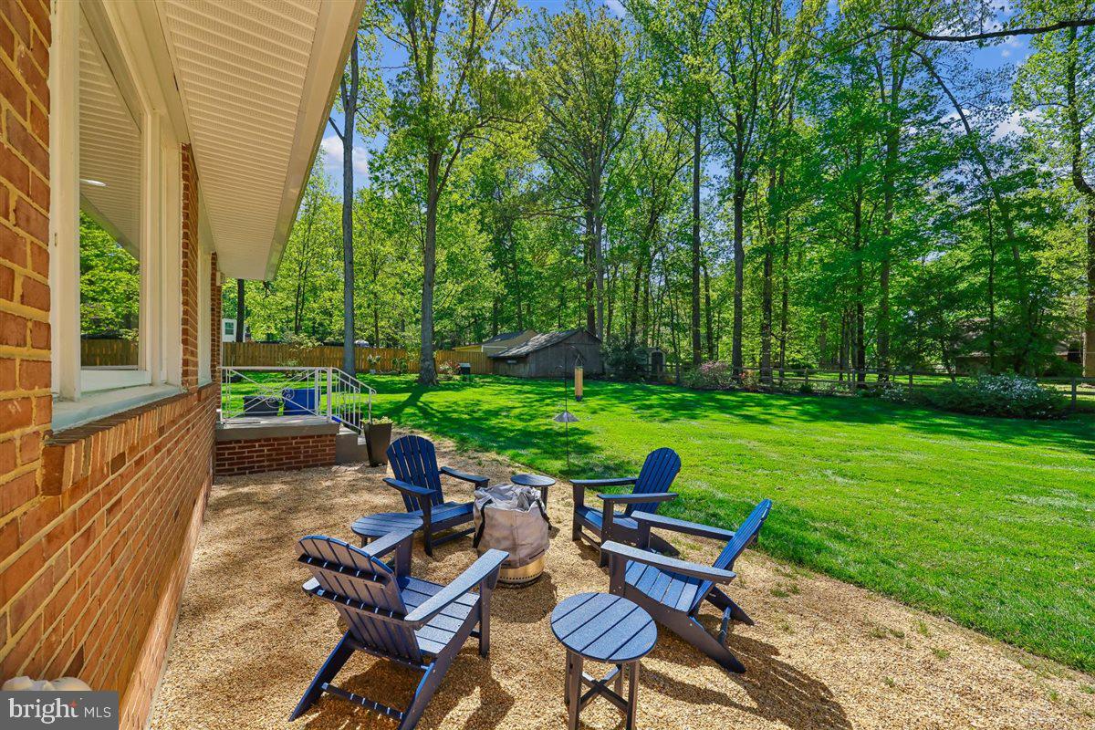4318 Pinetree Road Rockville, MD 20853 - Photo 115 of 130 a view of a chairs in backyard of the house
