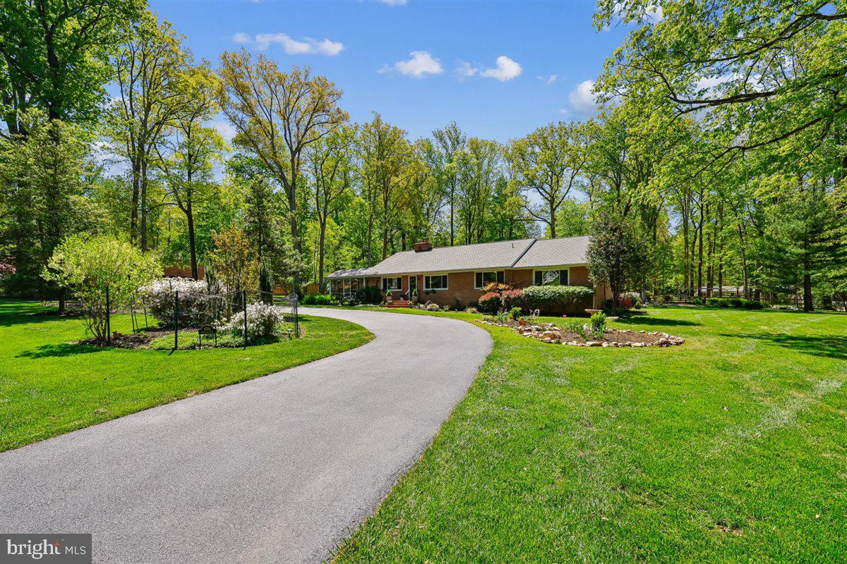 4318 Pinetree Road Rockville, MD 20853 - Photo 130 of 130 a view of a house with a yard and tree s