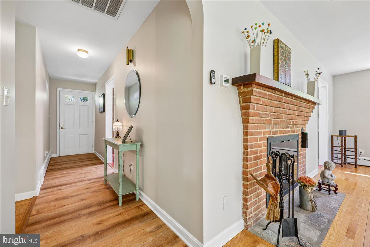 4318 Pinetree Road Rockville, MD 20853 - Photo 28 of 130 a view of a livingroom with furniture and a ceiling fan