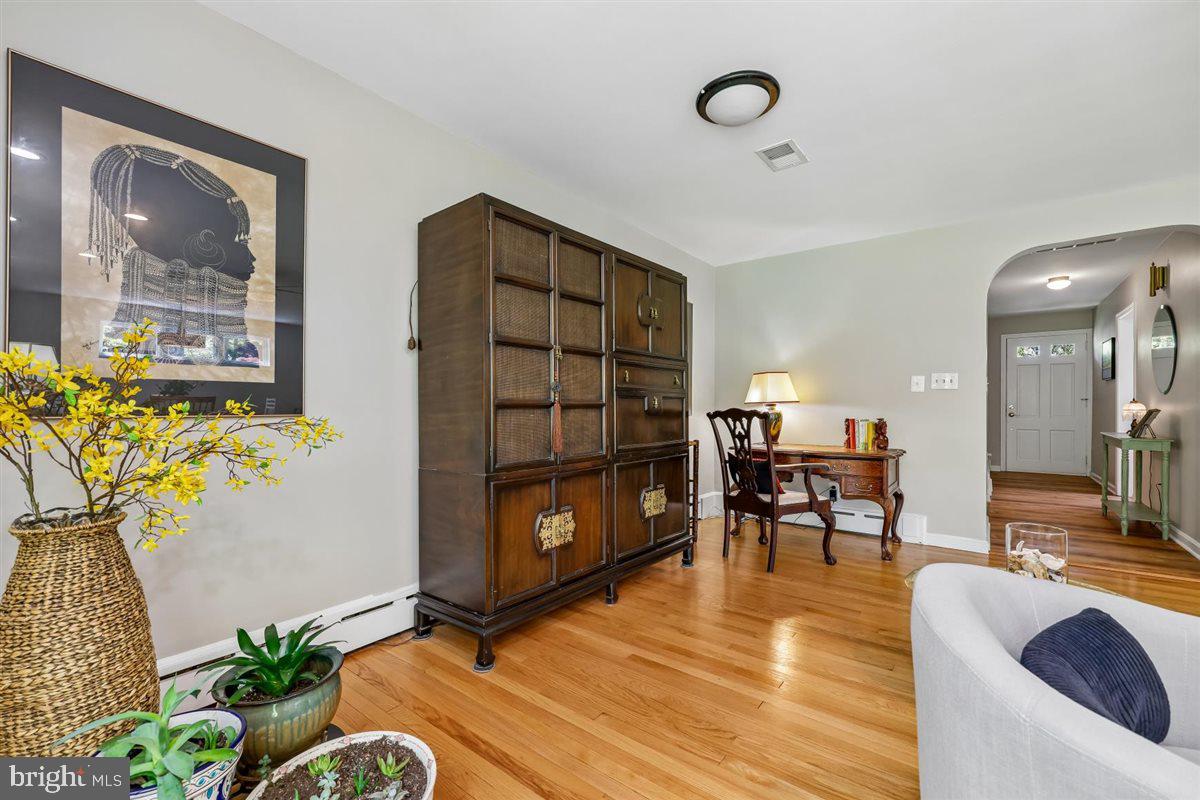 4318 Pinetree Road Rockville, MD 20853 - Photo 36 of 130 a view of a livingroom with furniture and a potted plant