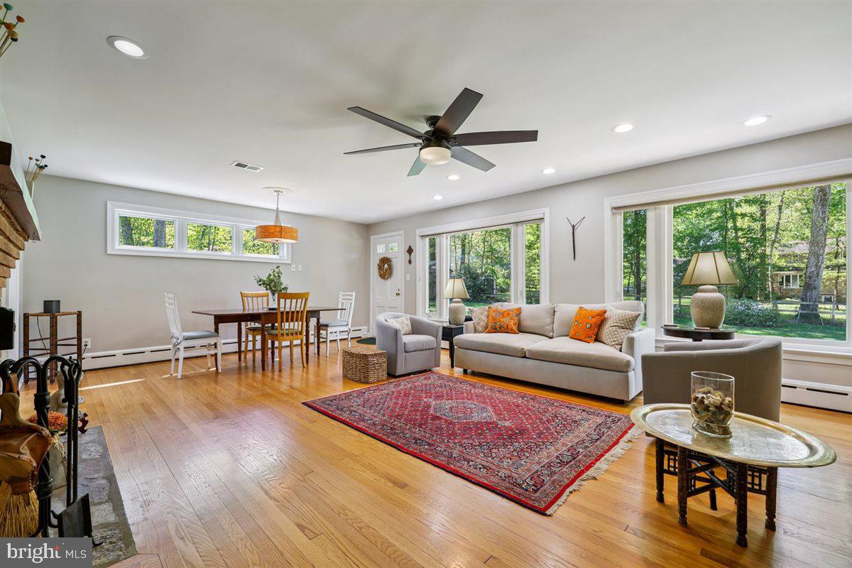 4318 Pinetree Road Rockville, MD 20853 - Photo 40 of 130 a living room with furniture and a table