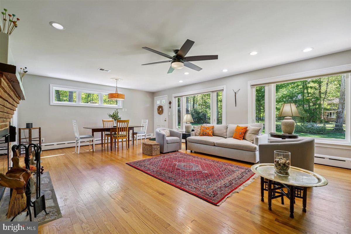 4318 Pinetree Road Rockville, MD 20853 - Photo 42 of 130 a living room with furniture and a large window