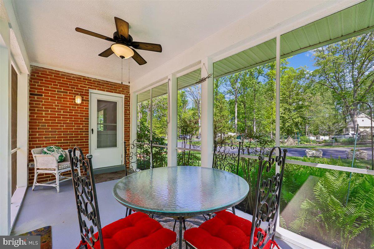 4318 Pinetree Road Rockville, MD 20853 - Photo 57 of 130 a view of a dining room with furniture window and outside view