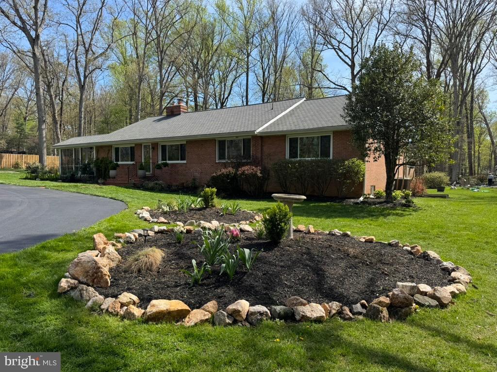 4318 Pinetree Road Rockville, MD 20853 - Photo 10 of 130 a front view of a house with a garden