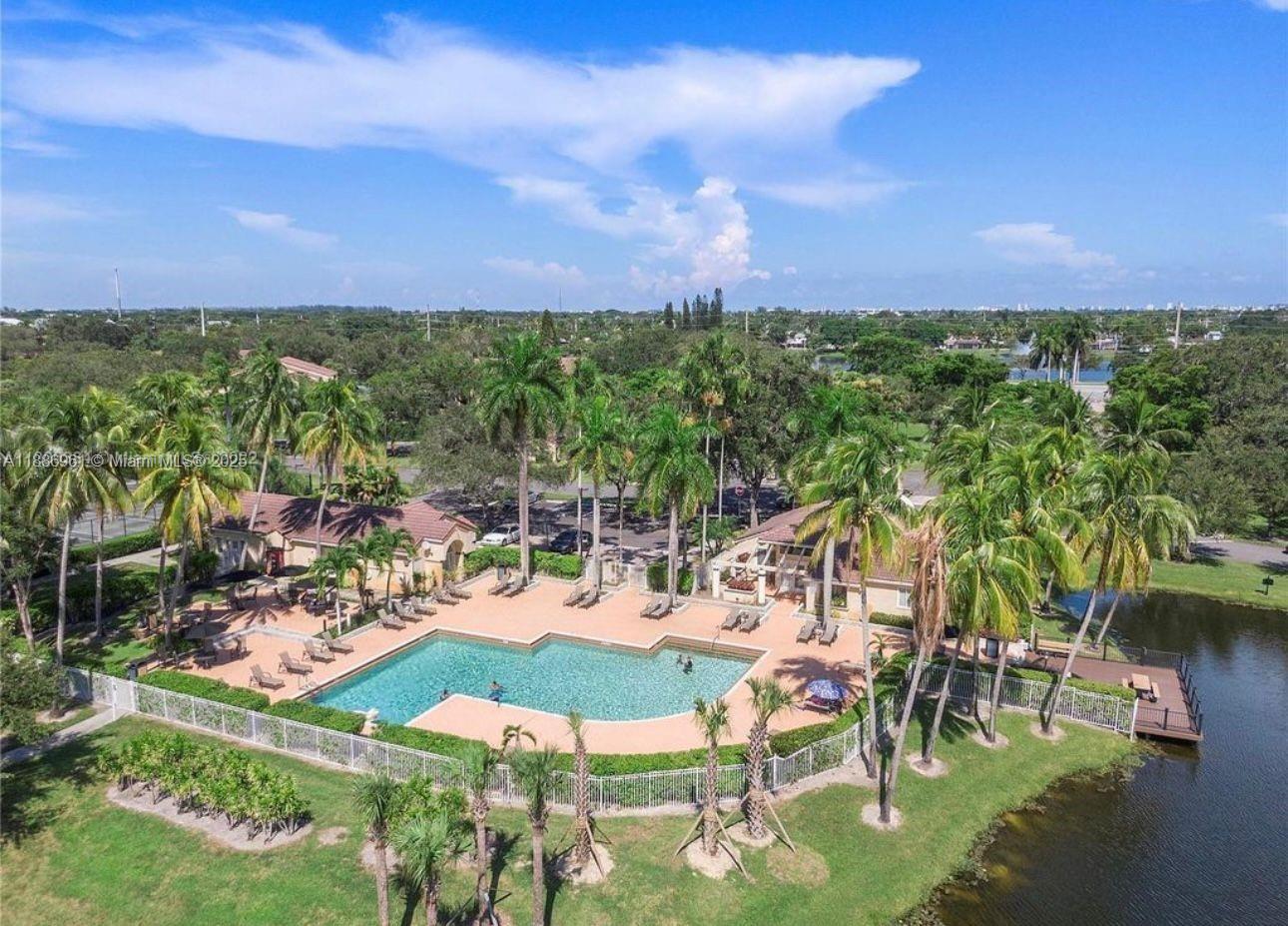 a view of a chairs and table in the patio