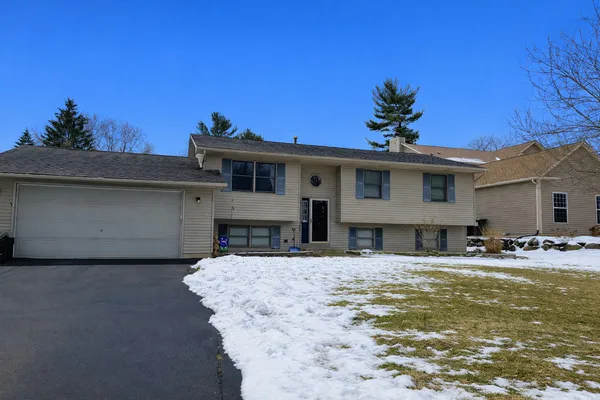 a view of a house with roof deck