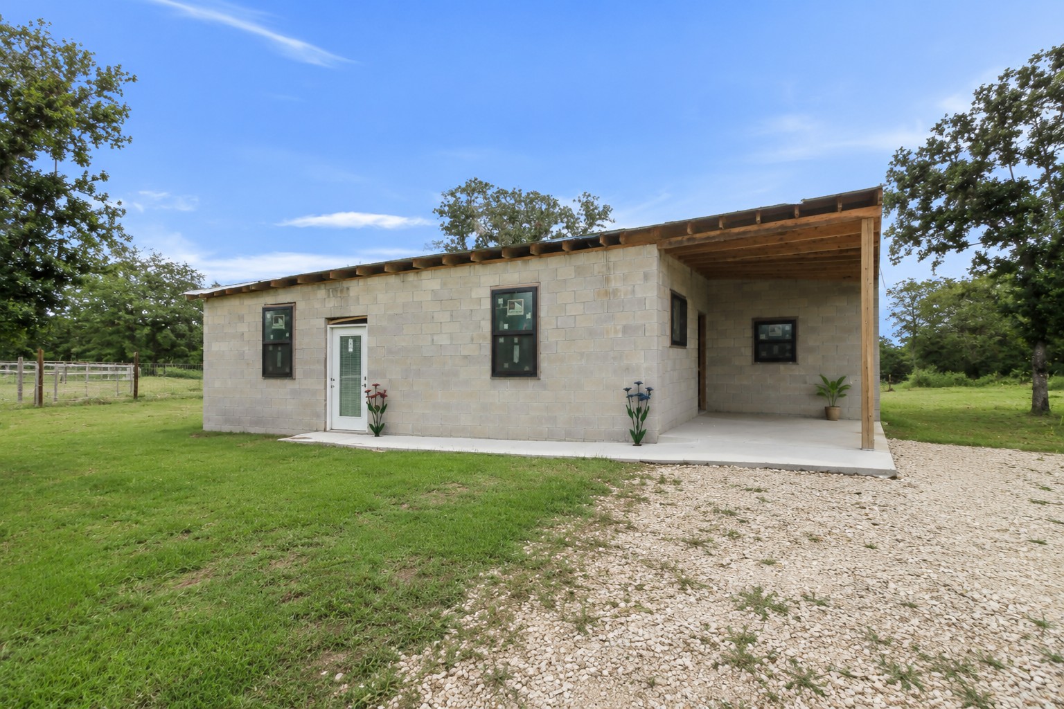 2755 Washburn Road Luling, TX 78648 - Photo 3 of 40 Concrete block house #2 with a covered entry, ready for you to complete construction and make it your own.