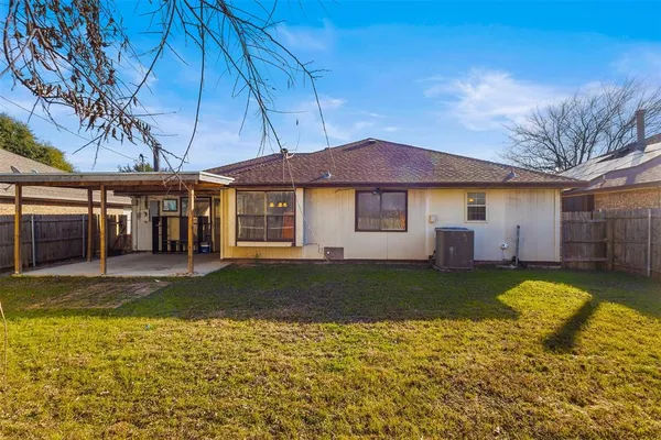 a view of a house with swimming pool and sitting area