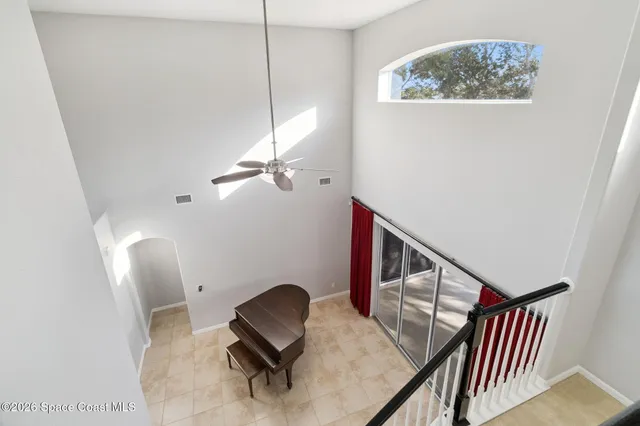 a view of a livingroom with furniture and chandelier